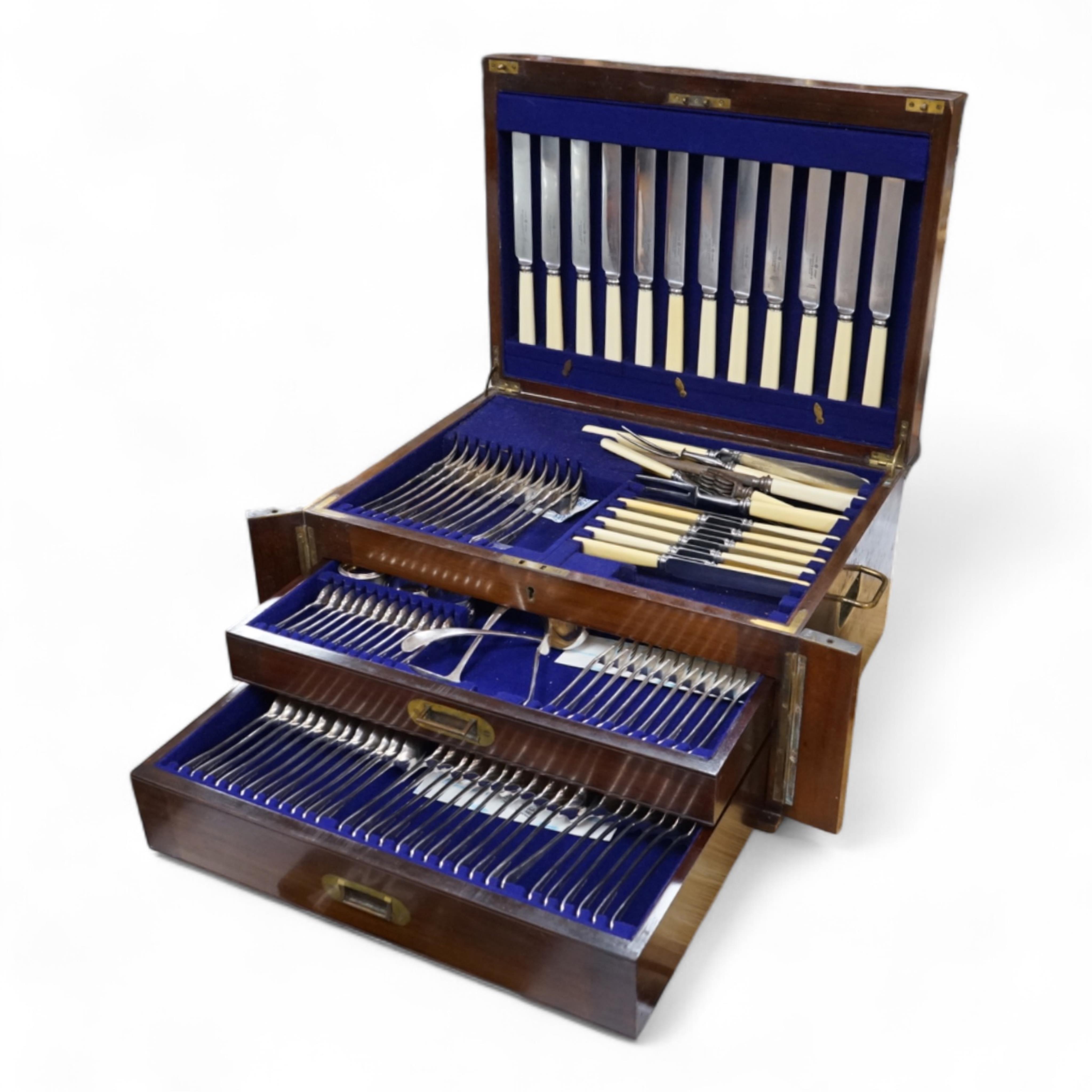 A Walker & Hall three-drawer canteen of plated cutlery. Canteen 48cm wide x 35cm deep x 24cm high. Condition - good